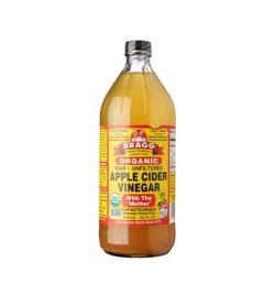 Orange bottle of Bragg Organic Raw Unfiltered Apple Cider Vinegar with the 'Mother' unpasteurized contains 946 ml