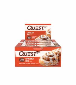 Orange box of 12 Quest Protein bars with Cinnamon Roll flavour each having 20 g protein shows glazed cinnamon bun on the package