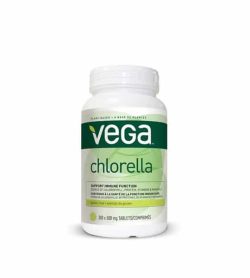 White and green bottle with white cap of Vega Chlorella 500 mg tablets contains 300
