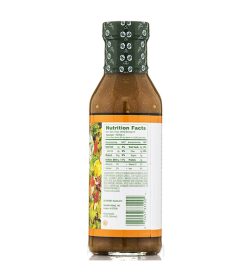 One white and orange bottle of Walden Farms Sesame Ginger 355ml showing nutrition facts